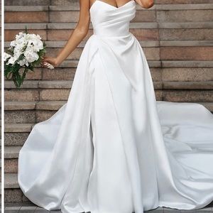 Sleeveless chapel train wedding dress